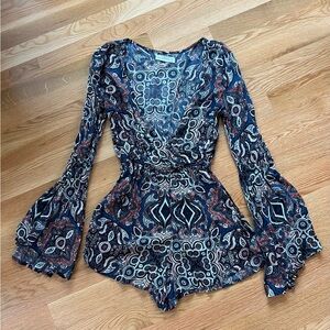Fun stylish romper. Great condition.